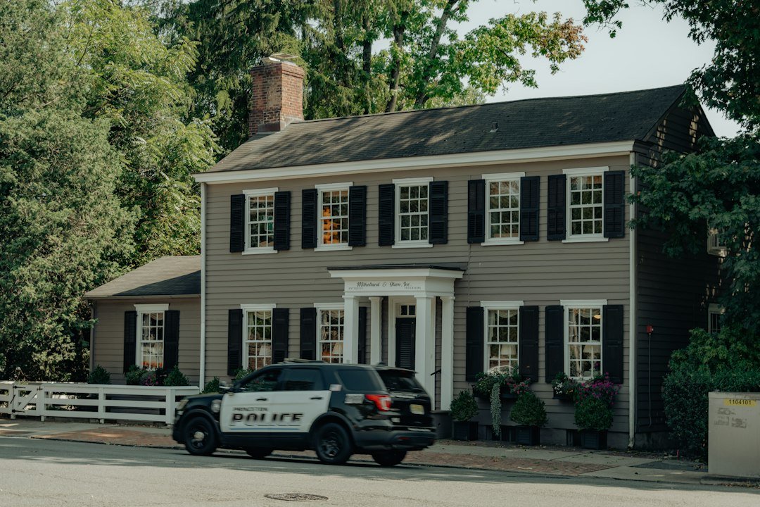 Police vehicle outside a residential home