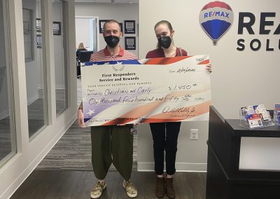 Christian and Carly's $1,450 Reward Check